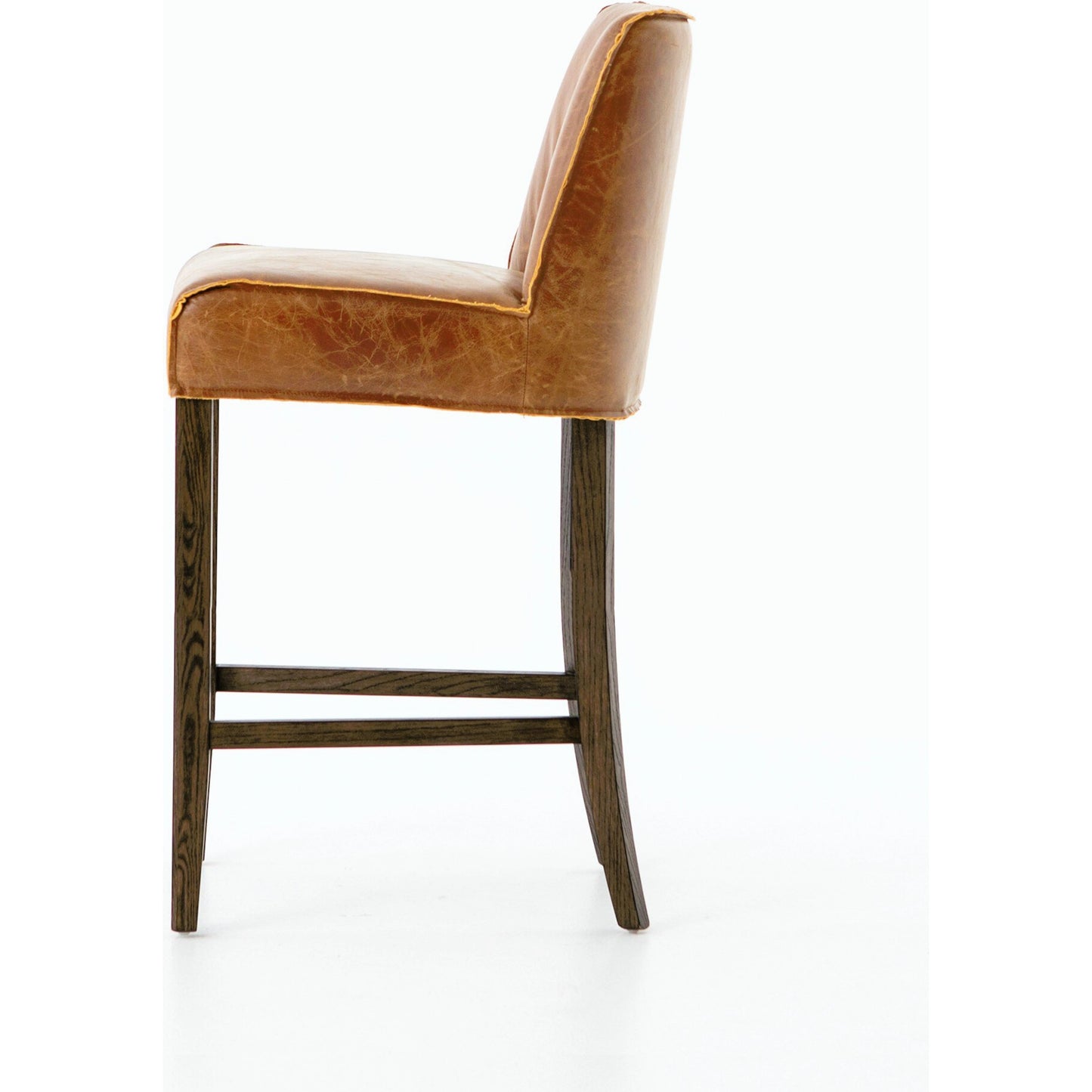 009 S-279148 | Additional Silo | Aria Counter Stool by Four Hands in sienna chestnut. Made from top grain leather, solid nettlewood, 100% polyester in a modern style.