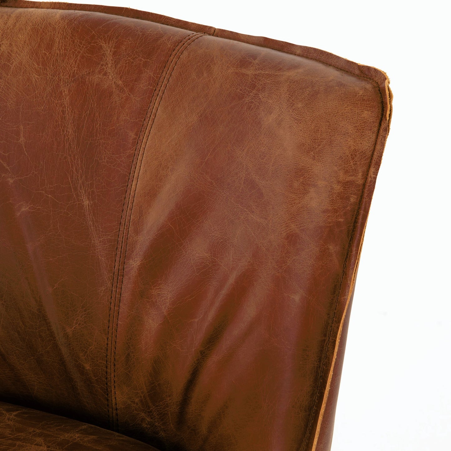 012 SR-711563 | Closeup | Aria Dining Chair by Four Hands in sienna chestnut, warm nettlewood and sienna chestnut. Made from top grain leather, solid nettlewood, 100% polyester in a modern style.