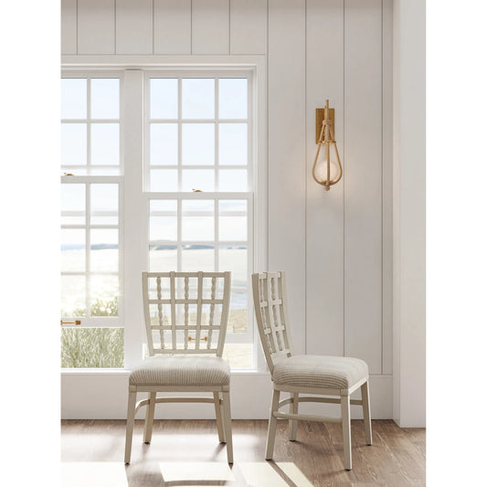 Passageway Wall Sconce by Currey and Company in natural rope, dorado gold, frosted. Made from abaca rope, wrought iron, glass in a coastal style.