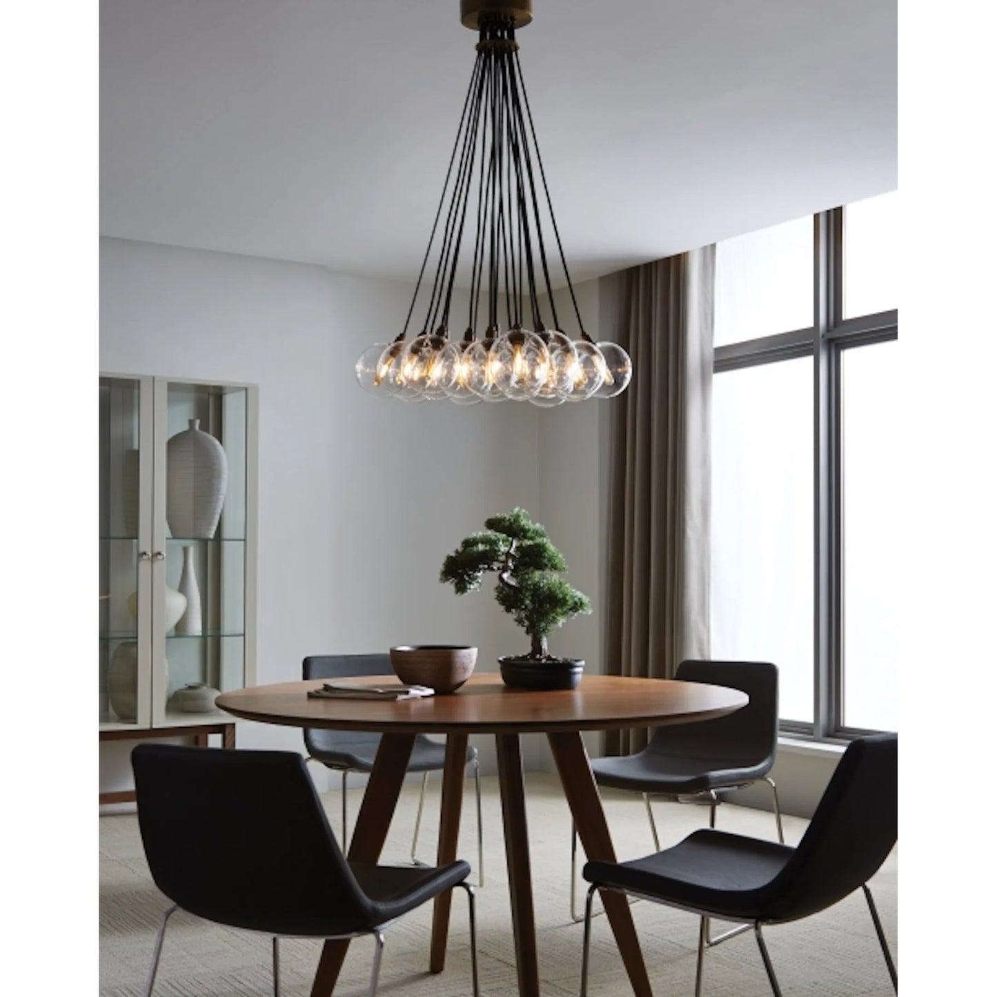 007 SR-807711,SR-807712 | Lifestyle | Gambit Multi-Port Chandelier by Tech Lighting in aged brass. Made from glass in a modern style.