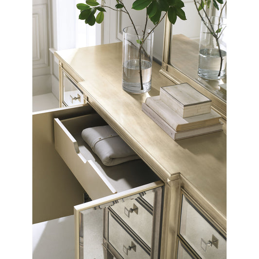 La-Dee-Dah-Dresser by Caracole in mirrored, silver and auric, gold bullion paint. Made from birch, maple, pine in a traditional style.