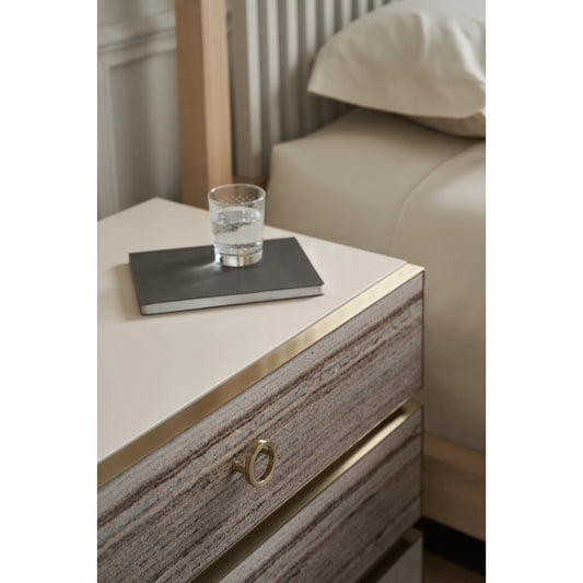 Bedrock Nightstand by Caracole in almond milk, champagne gold. Made from poplar, stone in a modern style.