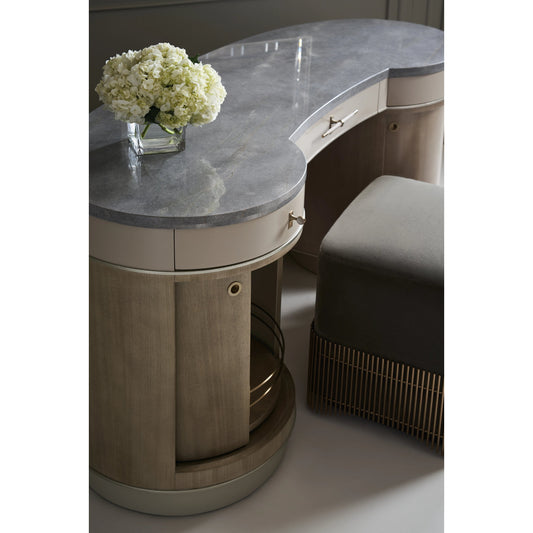 Vanity Fair by Caracole in dry martini, cloud, charcoal leaf, brushed gold. Made from poplar, marble, koto in a modern style.