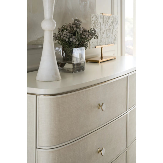 Lyon Dresser by Caracole in almond milk, brushed gold. Made from acacia, metal in a transitional style.