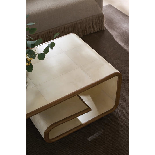 Delano Cocktail Table by Caracole in ivory parchment, toasted sycamore. Made from poplar, parchment in a unique style.