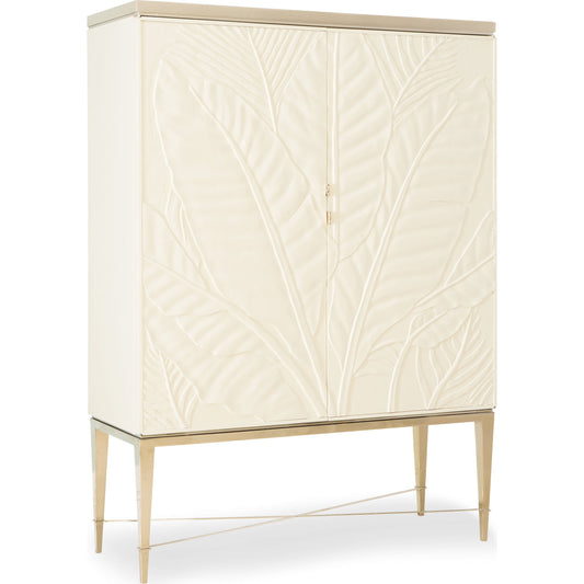 Palms Up! Bar Cabinet by Caracole in gold, ivory and wedding dress white, soft taupe, whisper of gold. Made from pine solids, pine veneers, metal in a transitional style.
