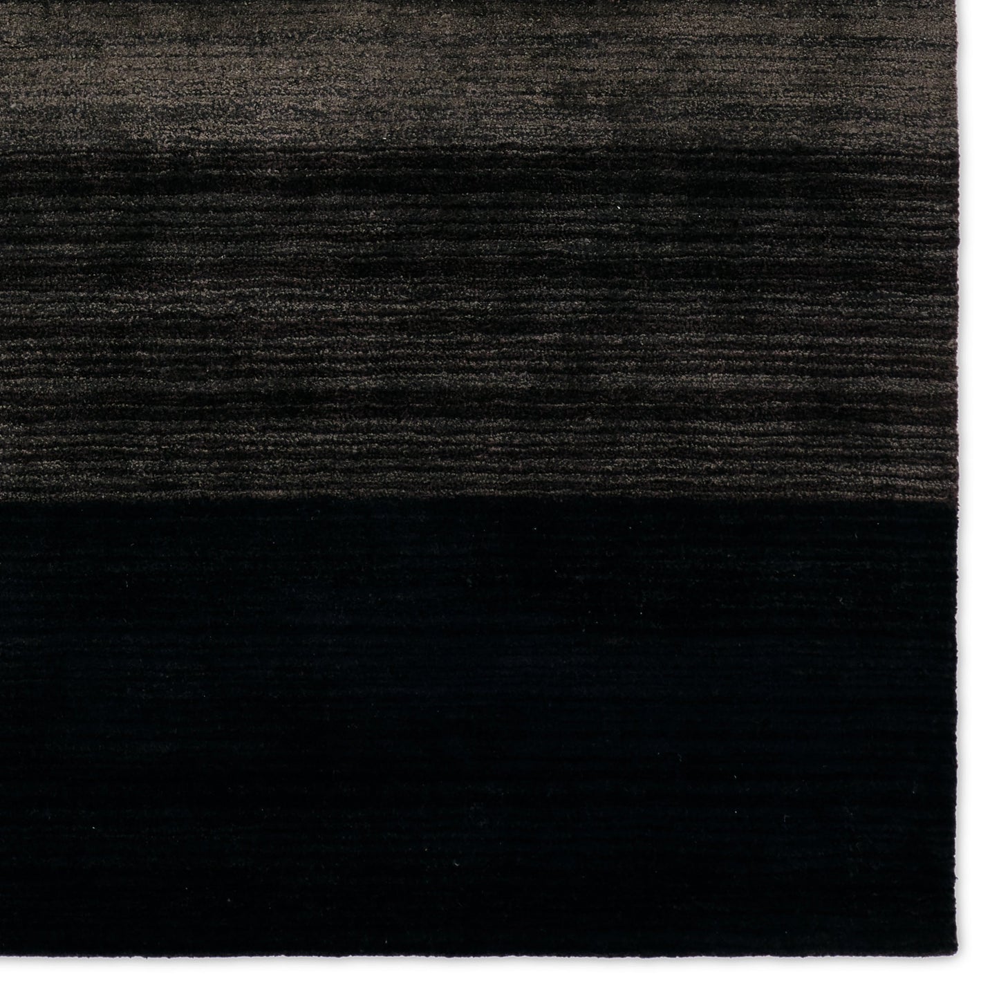 004 SI-2123457,SI-2123458,SI-2123459,SI-2123460 | Closeup | CMN01 Rug by Jaipur Living in black, gray. Made from 60% wool 40% viscose in a unique style.