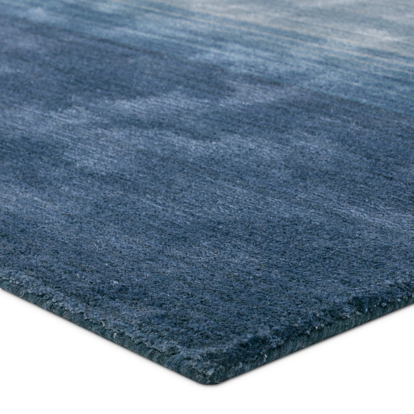 002 SI-2123461,SI-2123462,SI-2123463,SI-2123464 | Closeup | CMN02 Rug by Jaipur Living in blue, cream. Made from 60% wool 40% viscose in a unique style.