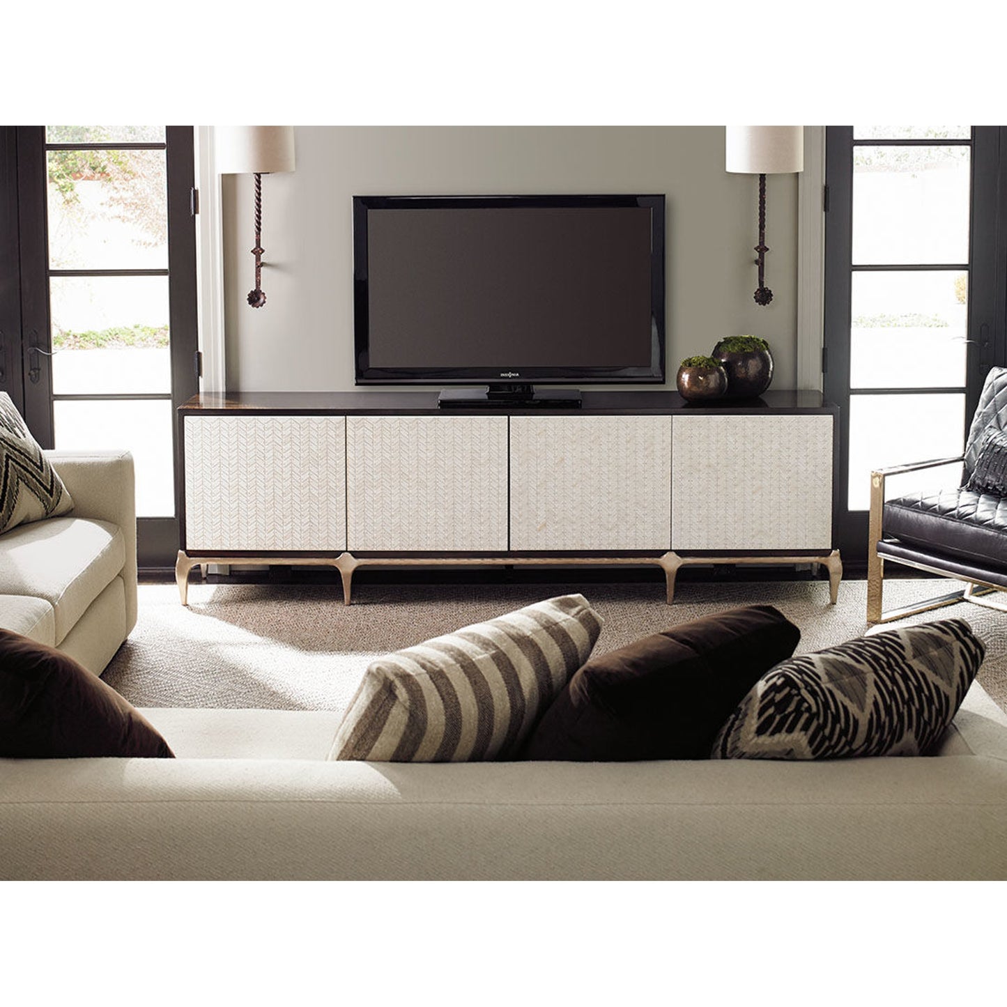 005 SR-768700 | Lifestyle | For Your Viewing Pleasure Cabinet by Caracole in bone and french roast, gold bullion paint. Made from fumed eucalyptus, hardwoods in a transitional style.