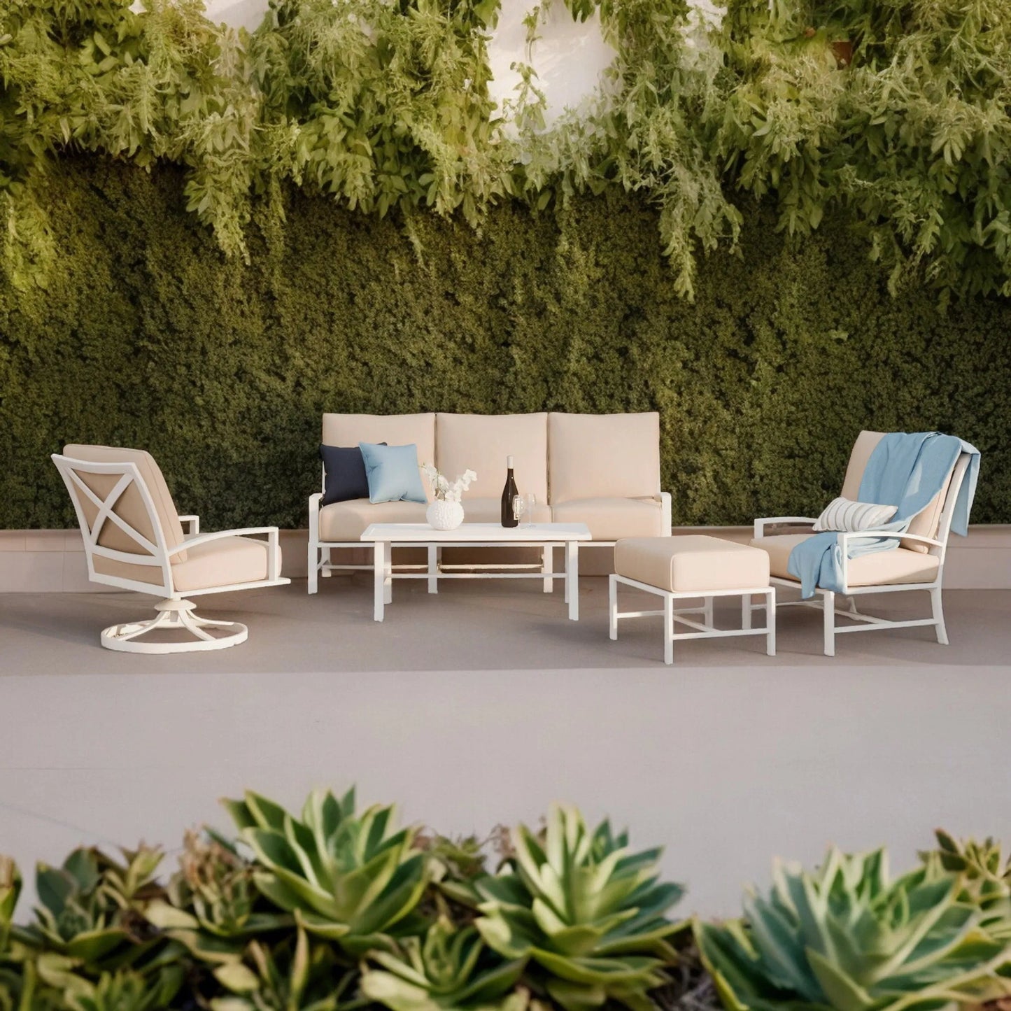 005 SI-2167195 | Lifestyle | Bristol Outdoor Sofa in Canvas Flax w/ Self Welt by Sunset West in white. Made from aluminum in a modern style.