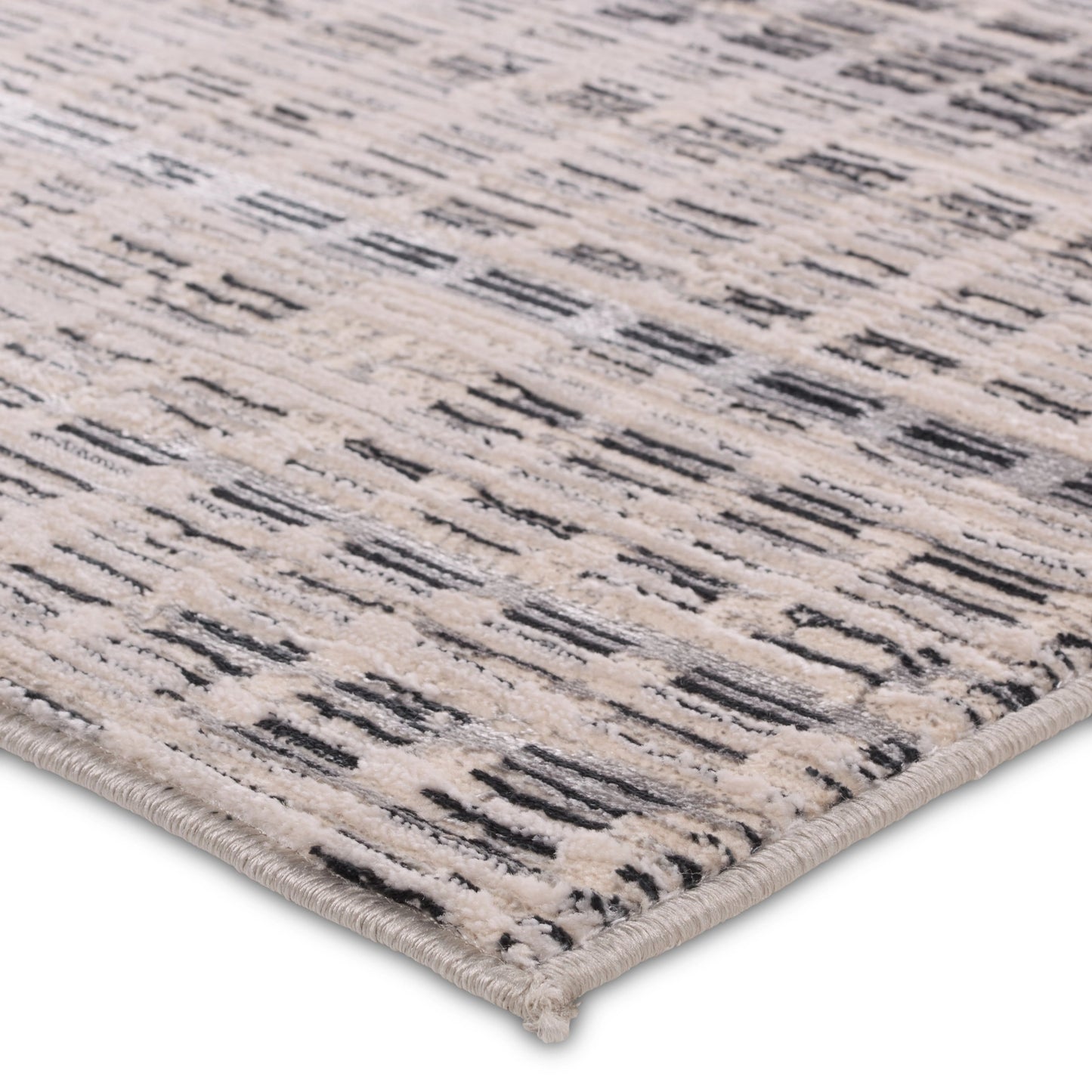 002 SI-2015028,SI-2015029,SI-2015030,SI-2015031,SI-2015032,SI-2015033 | Closeup | Catalyst Siran CTY32 Rug by Jaipur Living in gray, cream. Made from 65% polyester 35% polypropylene in a unique style.
