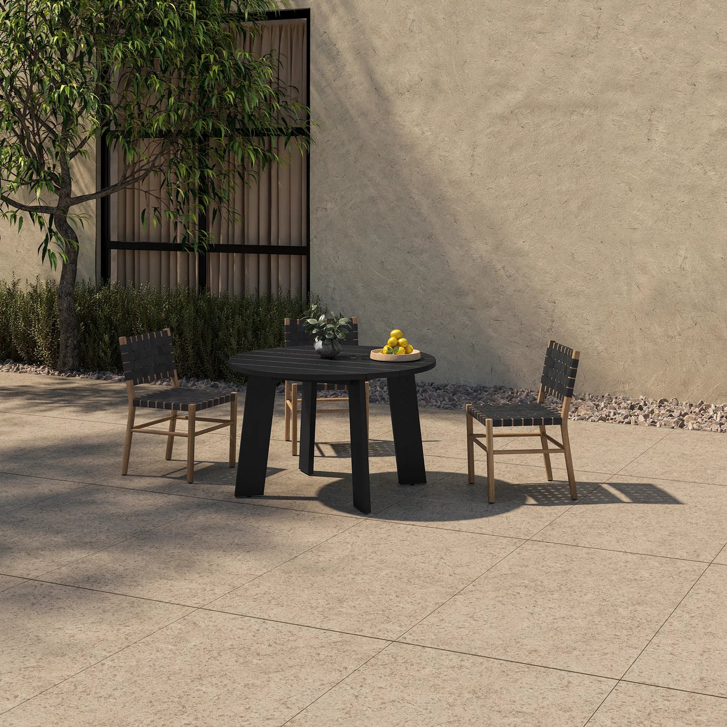 007 SI-2367967 | Lifestyle | Delta Round Outdoor Dining Table by Moe's Home Collection in black. Made from solid teak in a transitional style.