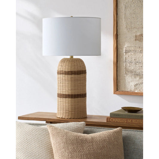 Caylus Accent Table Lamp by Livabliss in body: beige; shade: white; finial: metallic - brass; harp: metallic - brass; cord: translucent and natural, plated. Made from rattan, linen, polyester, iron in a rustic style.