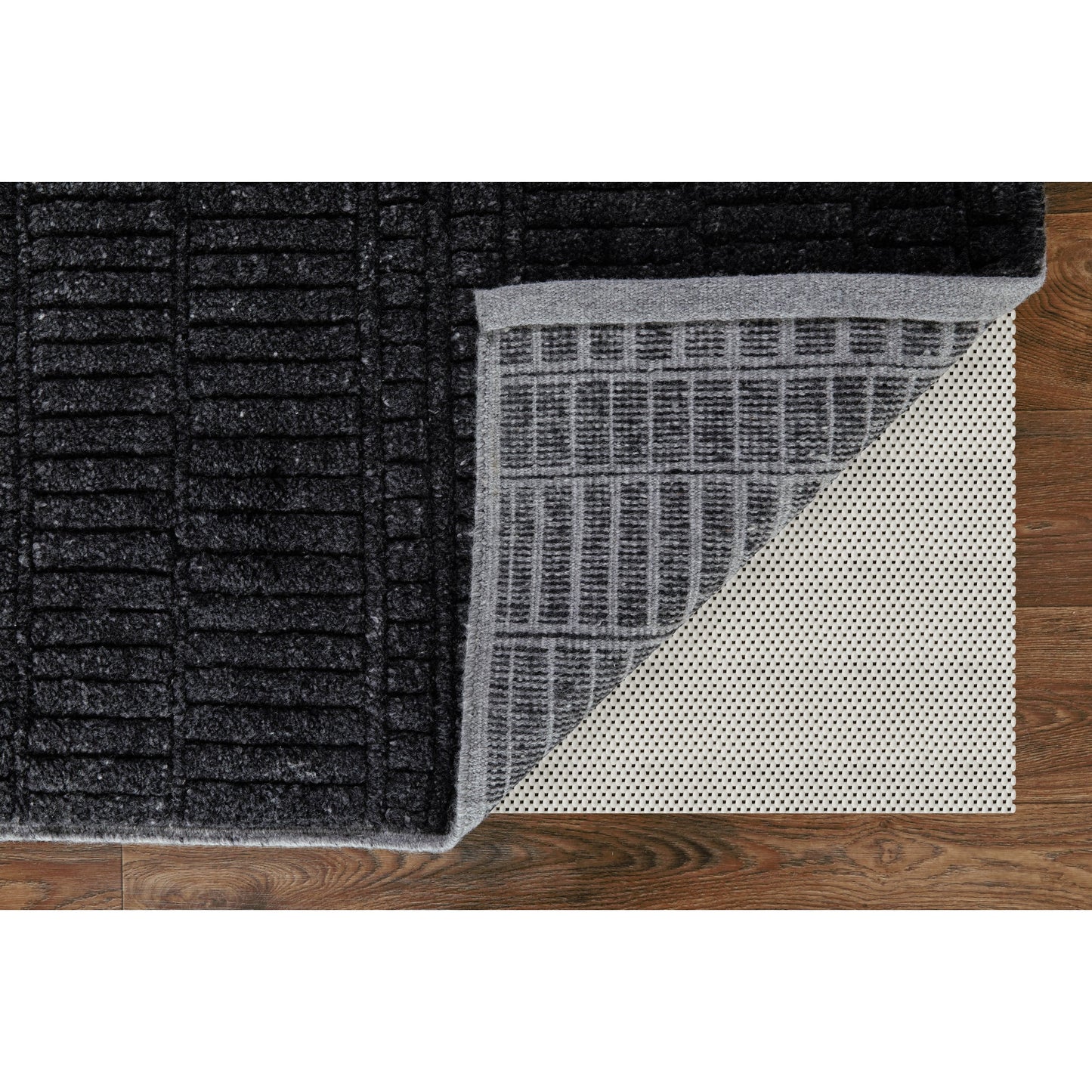 006 SI-2159065,SI-2159066,SI-2159067,SI-2159068,SI-2159071,SI-2159314 | Closeup | Vesper Transitional Solid Rug - T20T6036 by Thom Felicia by Feizy Rugs in black. Made from wool in a unique style.