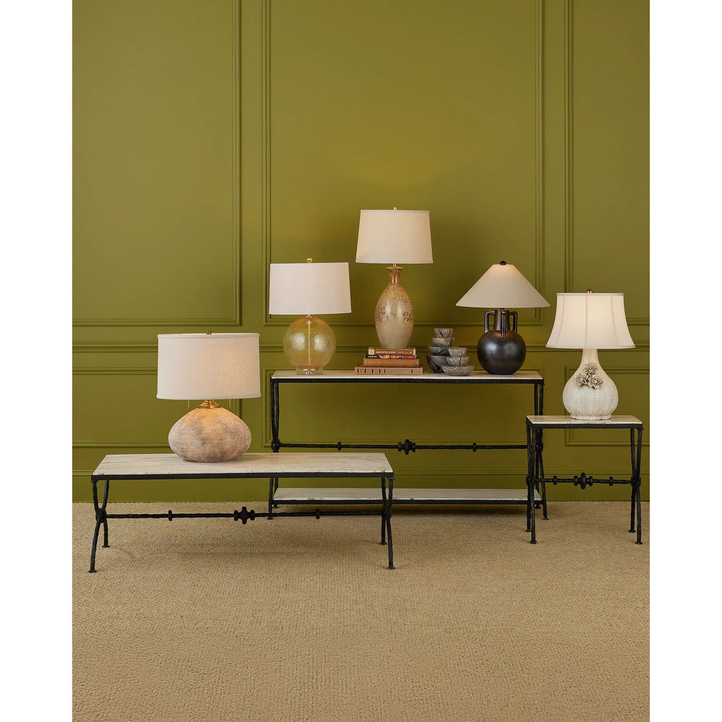 007 SI-2386930 | Lifestyle | Agora Cocktail Table by Currey and Company in natural, rustic bronze. Made from white travertine, wrought iron in a modern style.