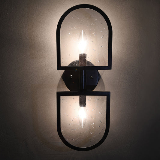 Dexter Sconce by Worlds Away in black. Made from metal, glass in a transitional style.