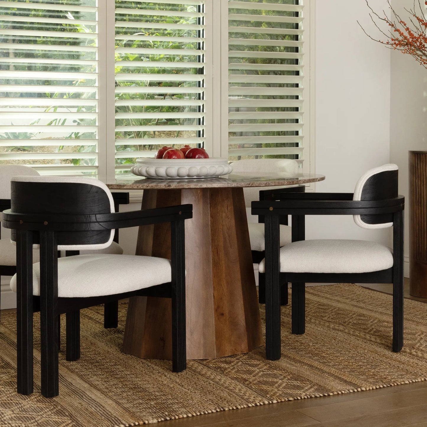 008 SI-2350536 | Lifestyle | Cali Dining Chair by Arch & Plane in off white, black frame. Made from polyester blend upholstery, mindi wood in a transitional style.