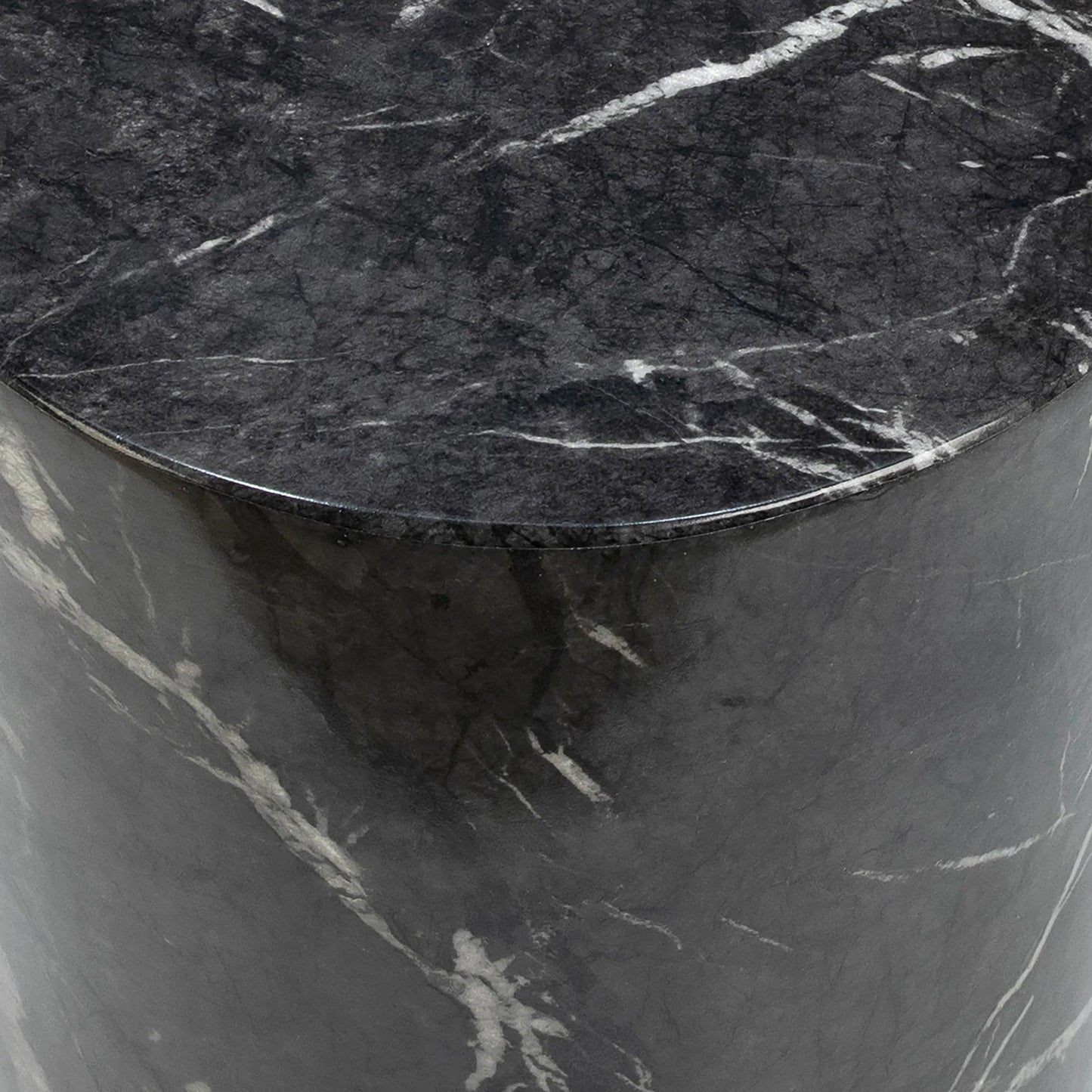 002 SI-2075446 | Closeup | Sully Concrete Side Table by Arch & Plane in black and black marble water-transfer with white veining. Made from lightweight concrete in a modern style.