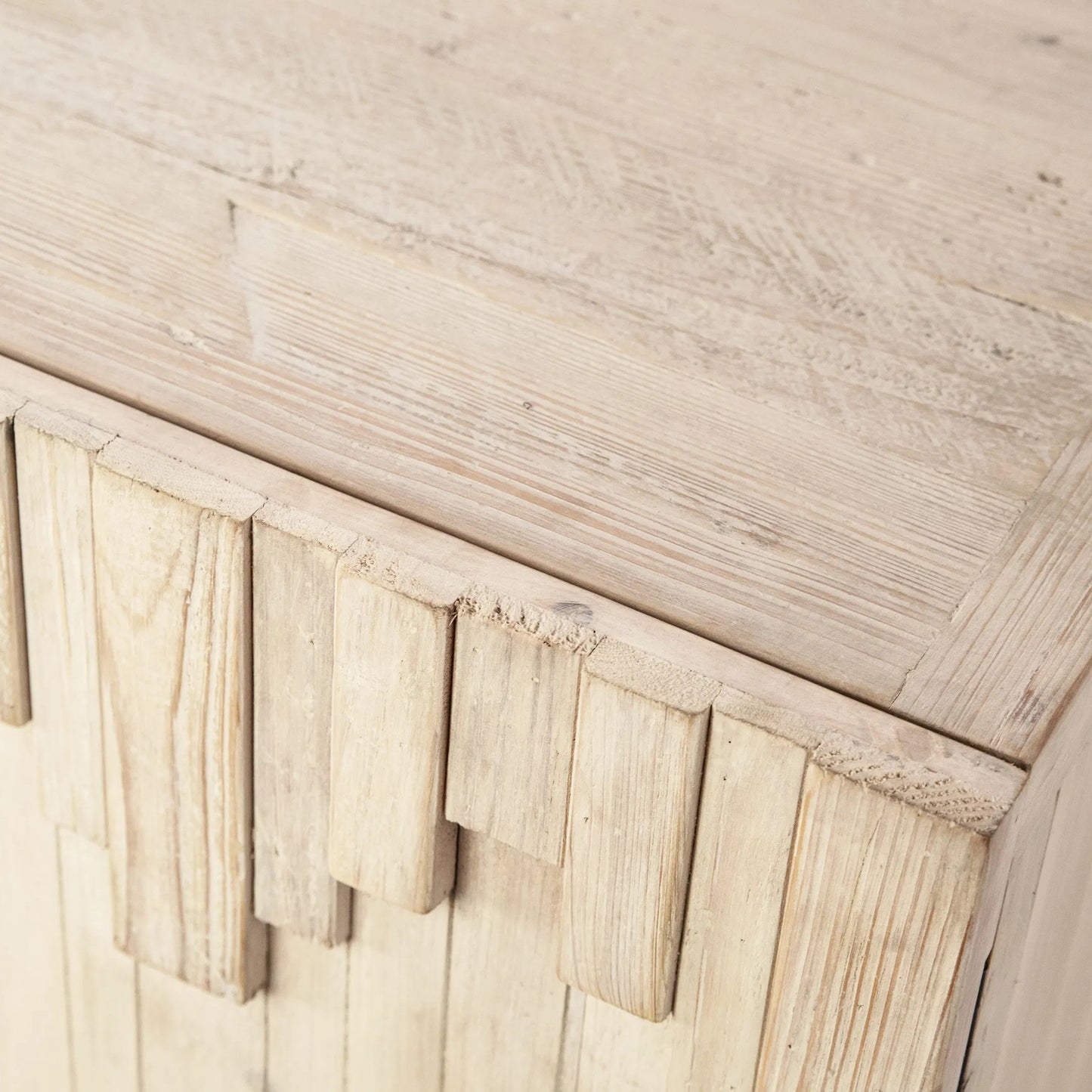 003 SI-2075342 | Closeup | Imani Hand Carved Sideboard by Arch & Plane in natural, light brown, black and light warm wash finish. Made from reclaimed pine wood, iron in a modern style.
