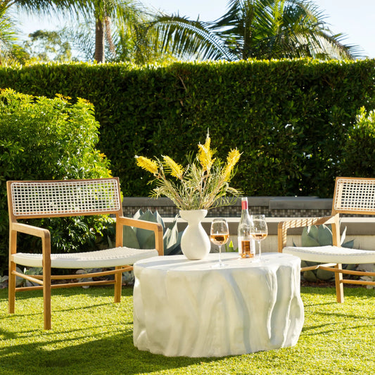 Chloe Outdoor Occasional Chair by Arch & Plane in white. Made from teak, synthetic rattan in a transitional style.