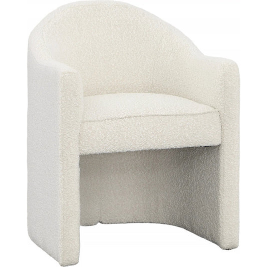 Thora Dining Chair by Arch & Plane. Made from boucle upholstery, solid pine wood in a transitional style.