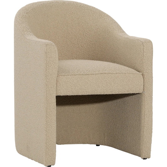 Thora Dining Chair by Arch & Plane. Made from boucle upholstery, solid pine wood in a transitional style.