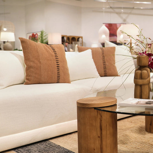 Nimue Pillow by Arch & Plane in taupe with black accents. Made from 100% wool cover with down alternative insert in a rustic style.