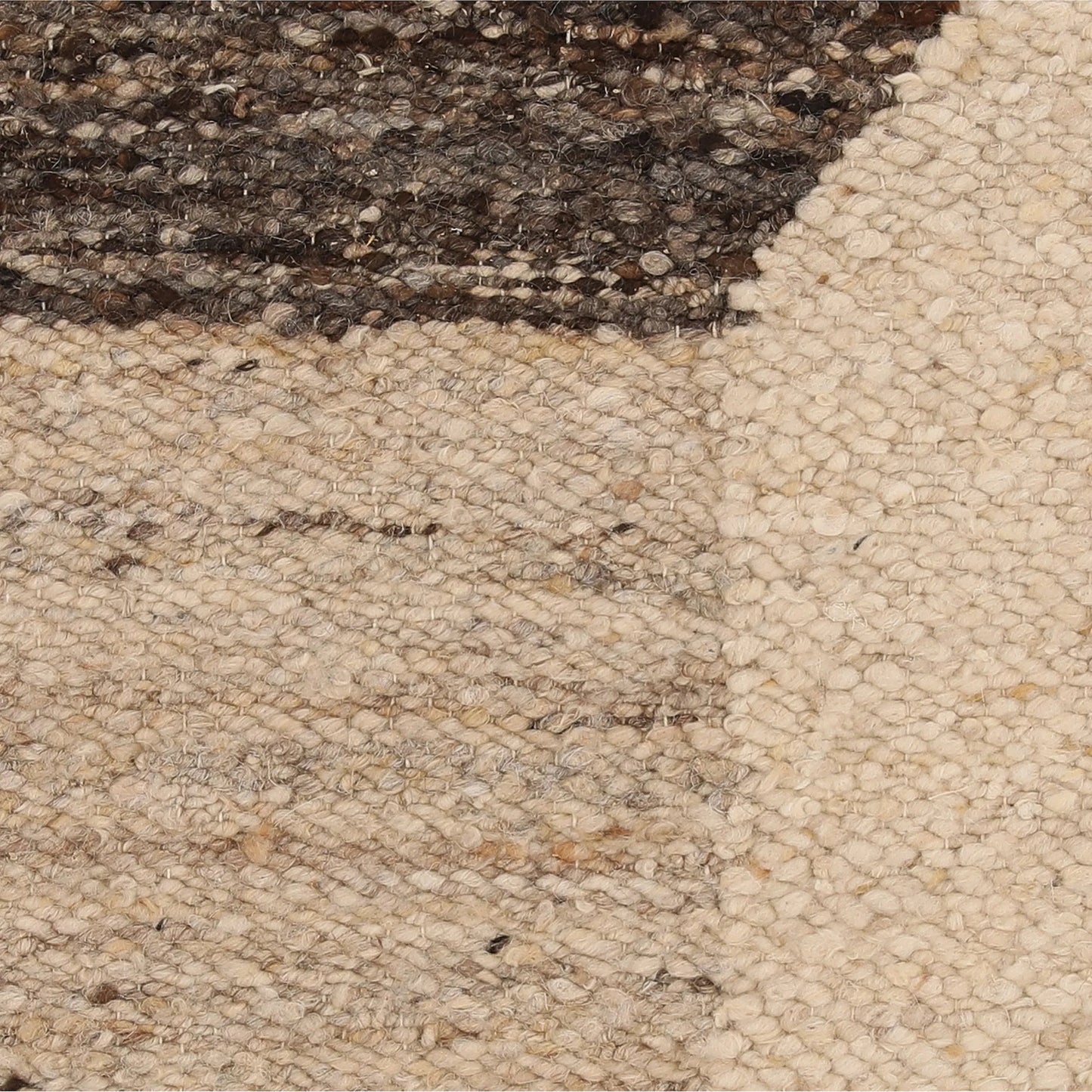003 SI-2532954 | Closeup | Gene Pillow by Arch & Plane in charcoal, ivory. Made from handwoven wool cover in a unique style.
