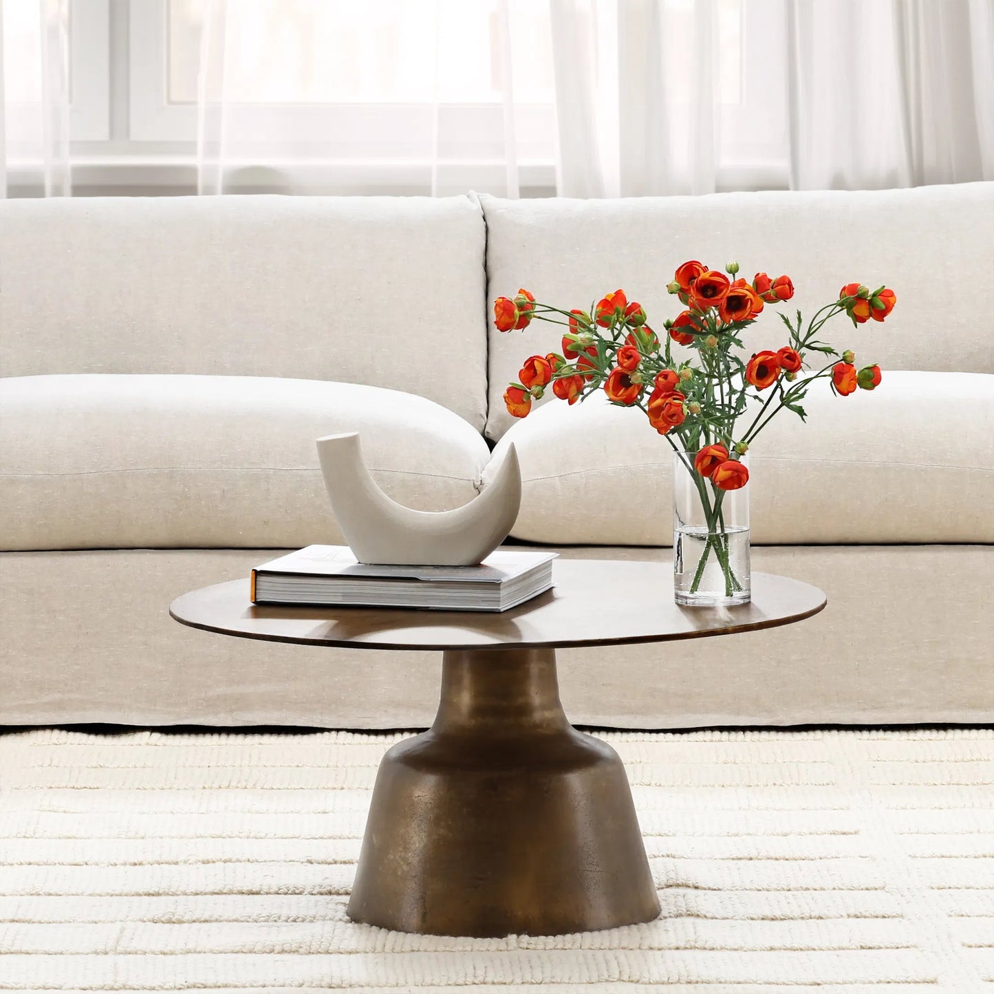 005 SI-2351120 | Lifestyle | Golbez Coffee Table by Arch & Plane in vintage brass antique. Made from cast aluminum in a modern style.