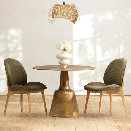 Golbez Dining Table by Arch & Plane in antique brass. Made from cast aluminum in a modern style.