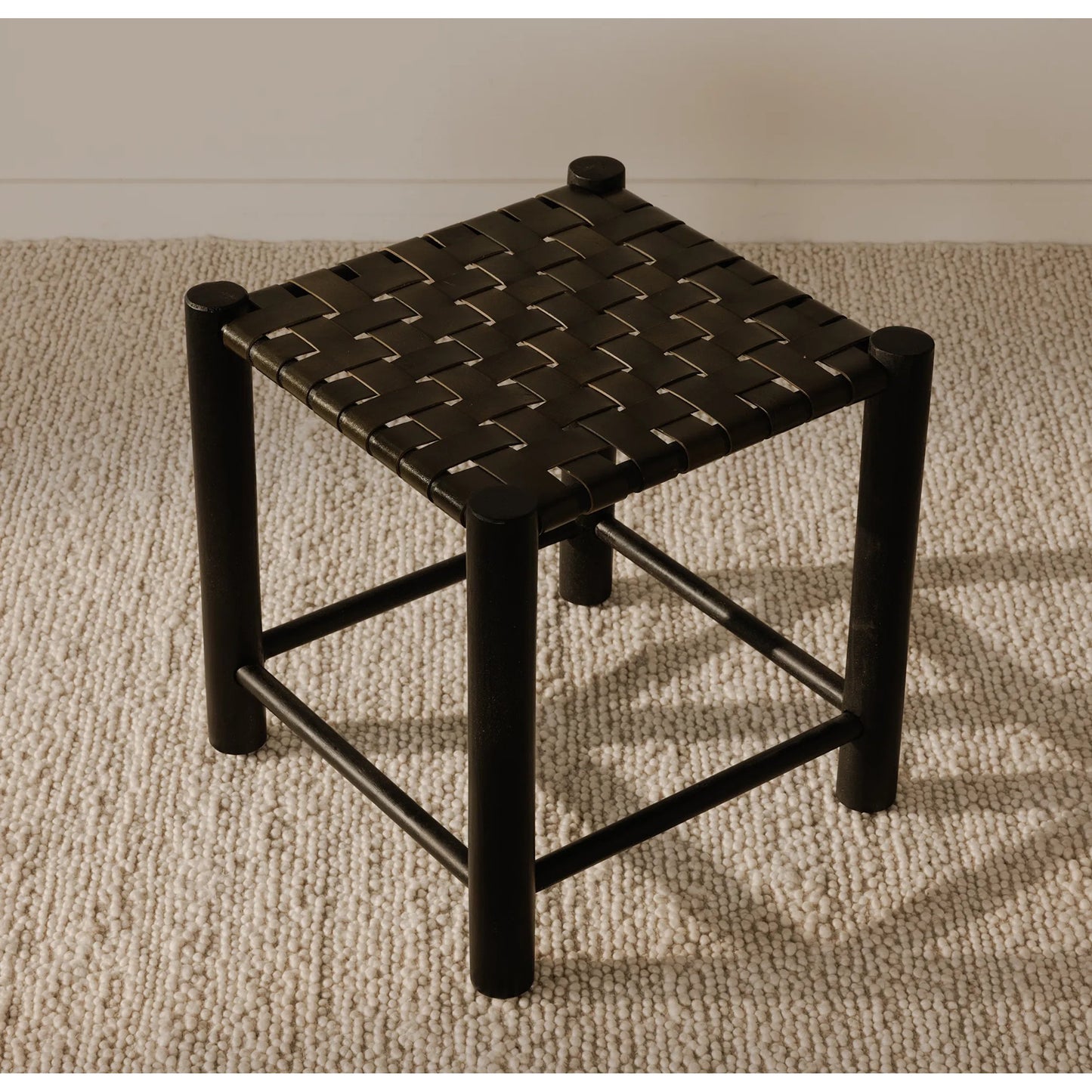 016 SI-2254020 | Lifestyle | Selby Stool by Moe's Home Collection in black and black. Made from solid mango wood frame, buffalo leather seat in a traditional style.