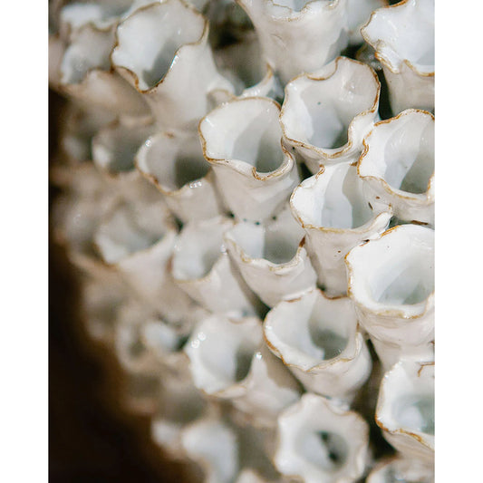 Manitapi Medium White Vase by Currey and Company in white. Made from ceramic in a coastal style.