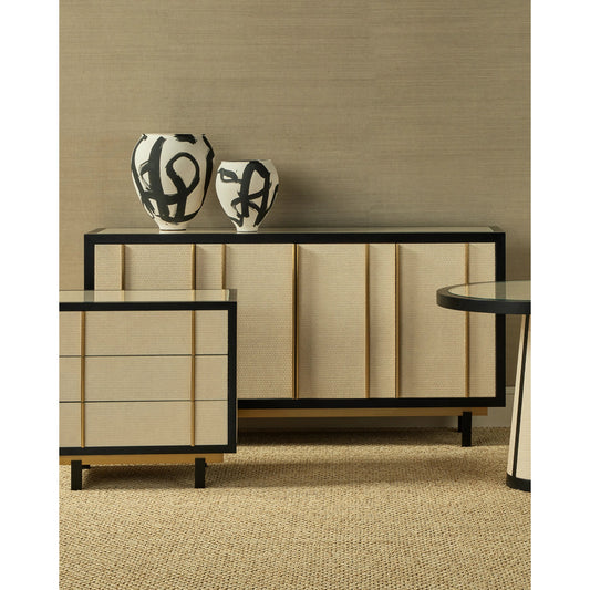 Deanna Raffia Credenza by Currey and Company in ivory, black, satin brass, natural, clear. Made from raffia, okume veneer, stainless steel, sycamore veneer, tempered glass in a modern style.