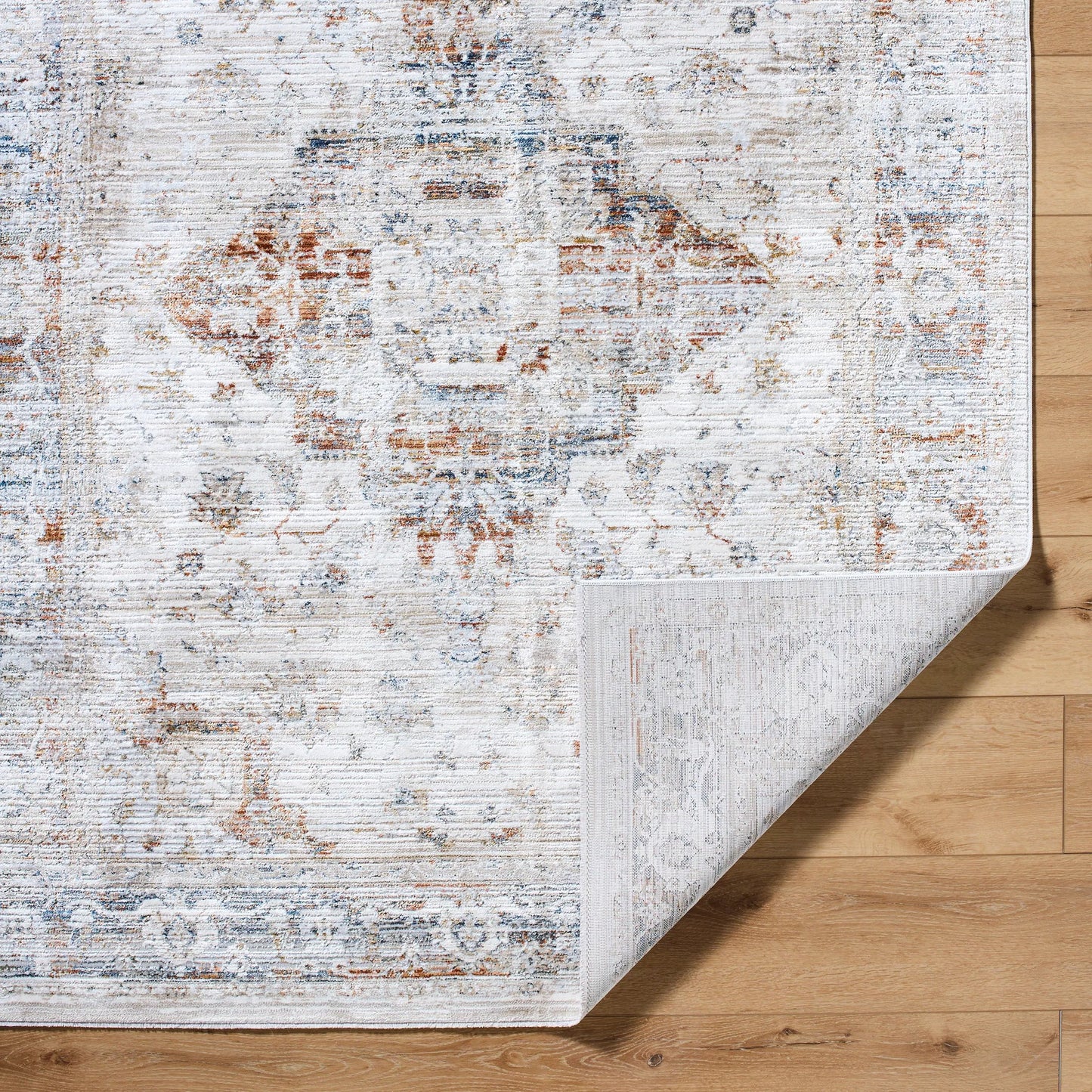 004 SI-2167695,SI-2167696,SI-2167697,SI-2167698,SI-2167699 | Closeup | Edmonton Rug - 489767 by Livabliss in cream, tan, light gray, dark blue, burnt orange, mustard. Made from polypropylene, polyester in a unique style.