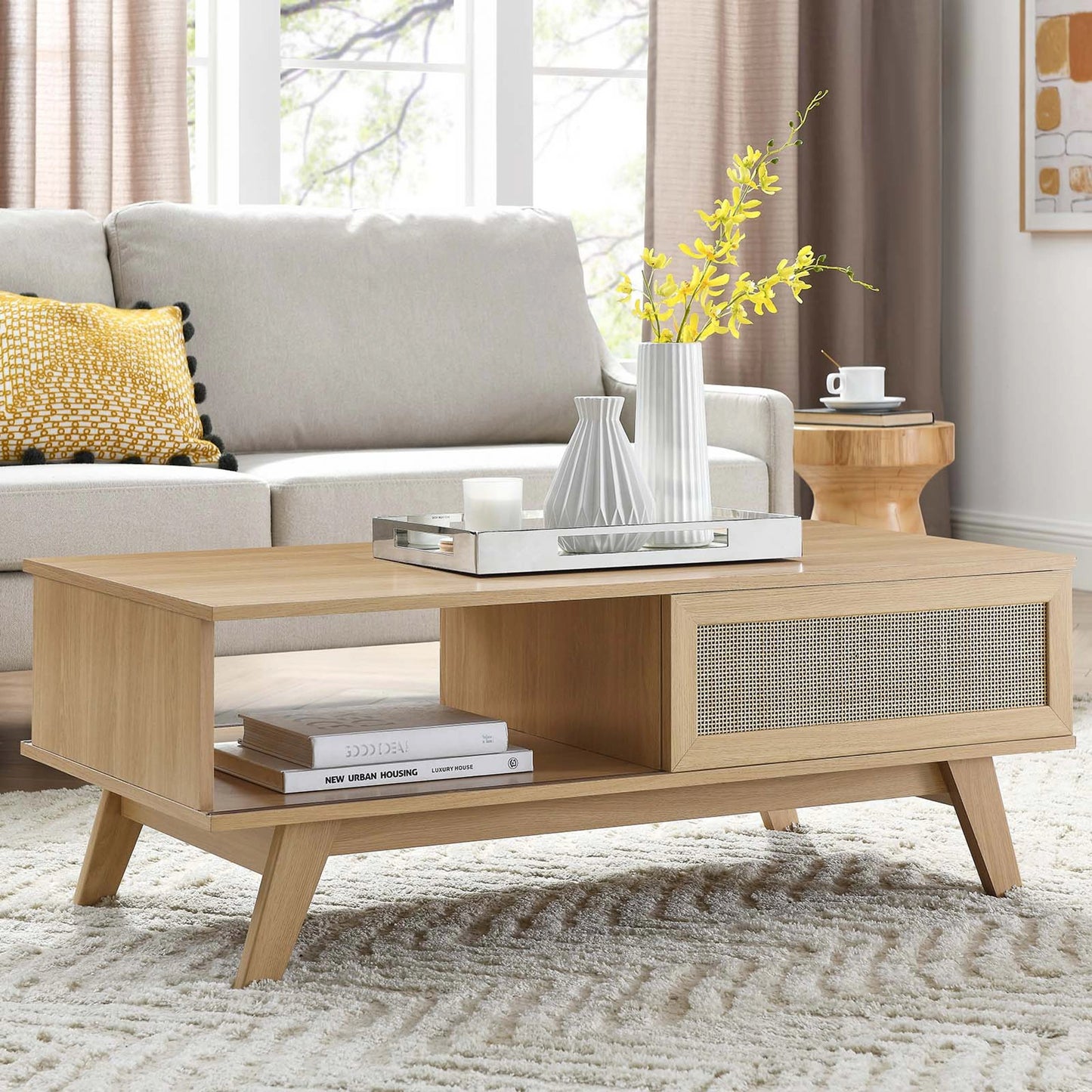 008 SI-2002614 | Lifestyle | Oldham Coffee Table by Evans & Londeen. Made from particle board, paper, mdf, rattan, weight capacity: top panel : 189 lbs, bottom panel : 44 lbs in a modern style.