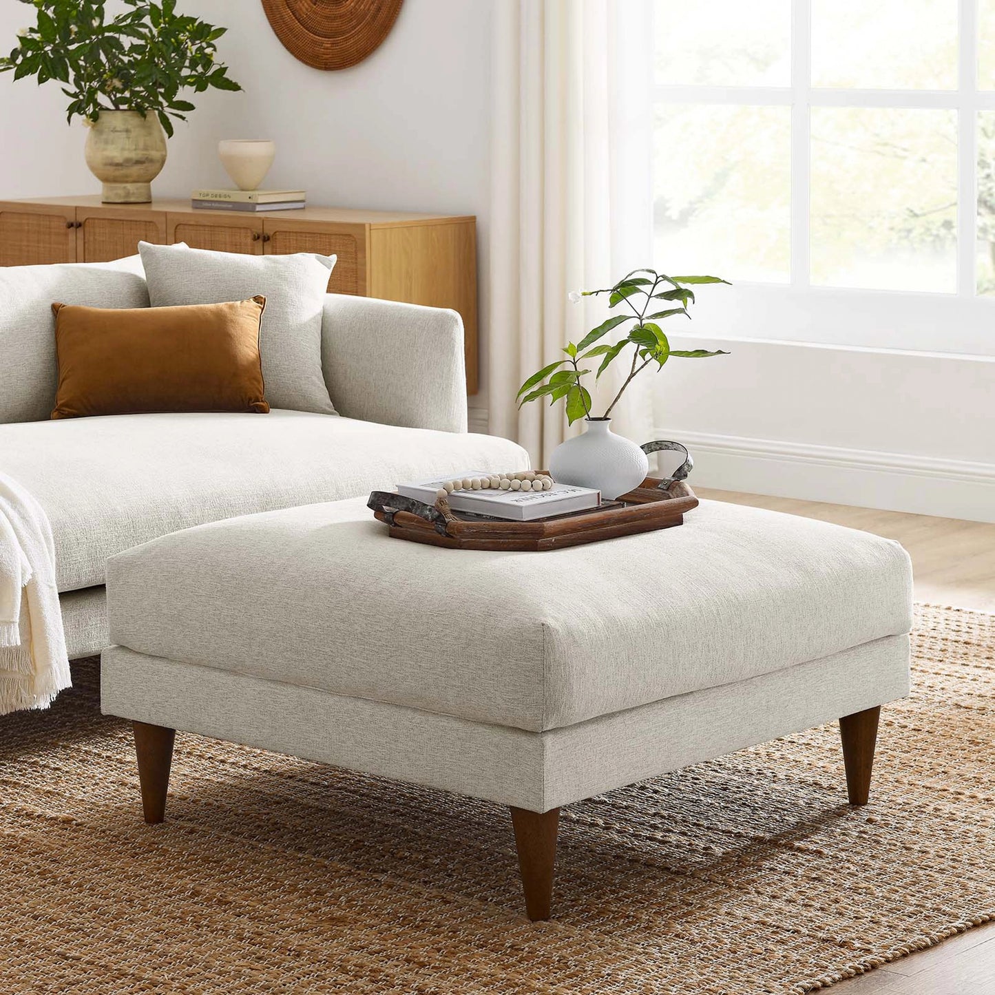003 SI-2135579 | Lifestyle | Okanogan Down Filled Overstuffed Ottoman by Evans & Londeen in ivory fabric. Made from unique in a modern style.