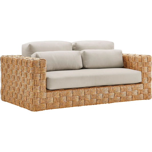 Volusia Rattan Loveseat by Evans & Londeen in natural light gray. Made from rattan in a rustic style.