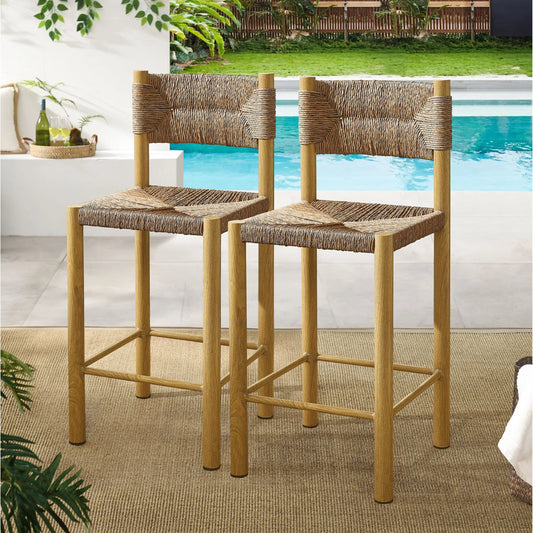 Spink Rattan and Aluminum Counter Stools (Set of 2) by Evans & Londeen. Made from rattan, aluminum in a rustic style.