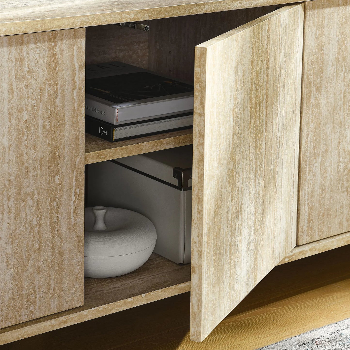 009 SI-2358125 | Lifestyle | Dona 63” Oval Faux Travertine TV Stand by Evans & Londeen in travertine. Made from faux travertine in a transitional style.