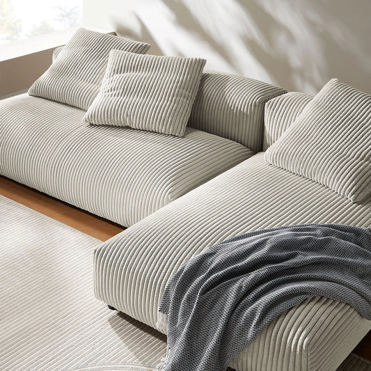 Lost 2-Piece Modular Corduroy Sectional Sofa With Chaise by Evans & Londeen. Made from corduroy upholstered in a transitional style.