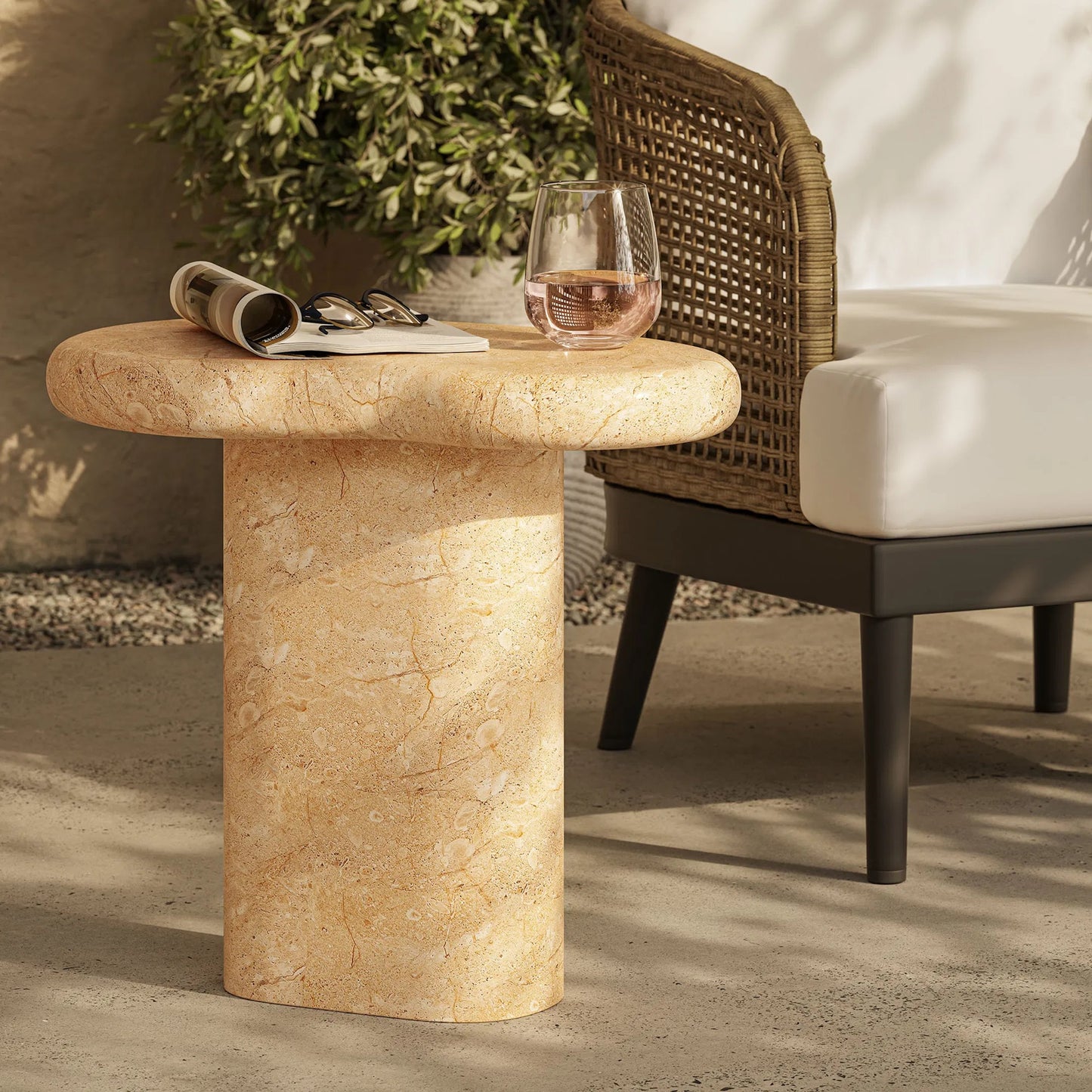 009 SI-2358294 | Lifestyle | Buckeye Outdoor Textured Faux Travertine Side Table by Evans & Londeen in travertine. Made from textured faux travertine in a unique style.