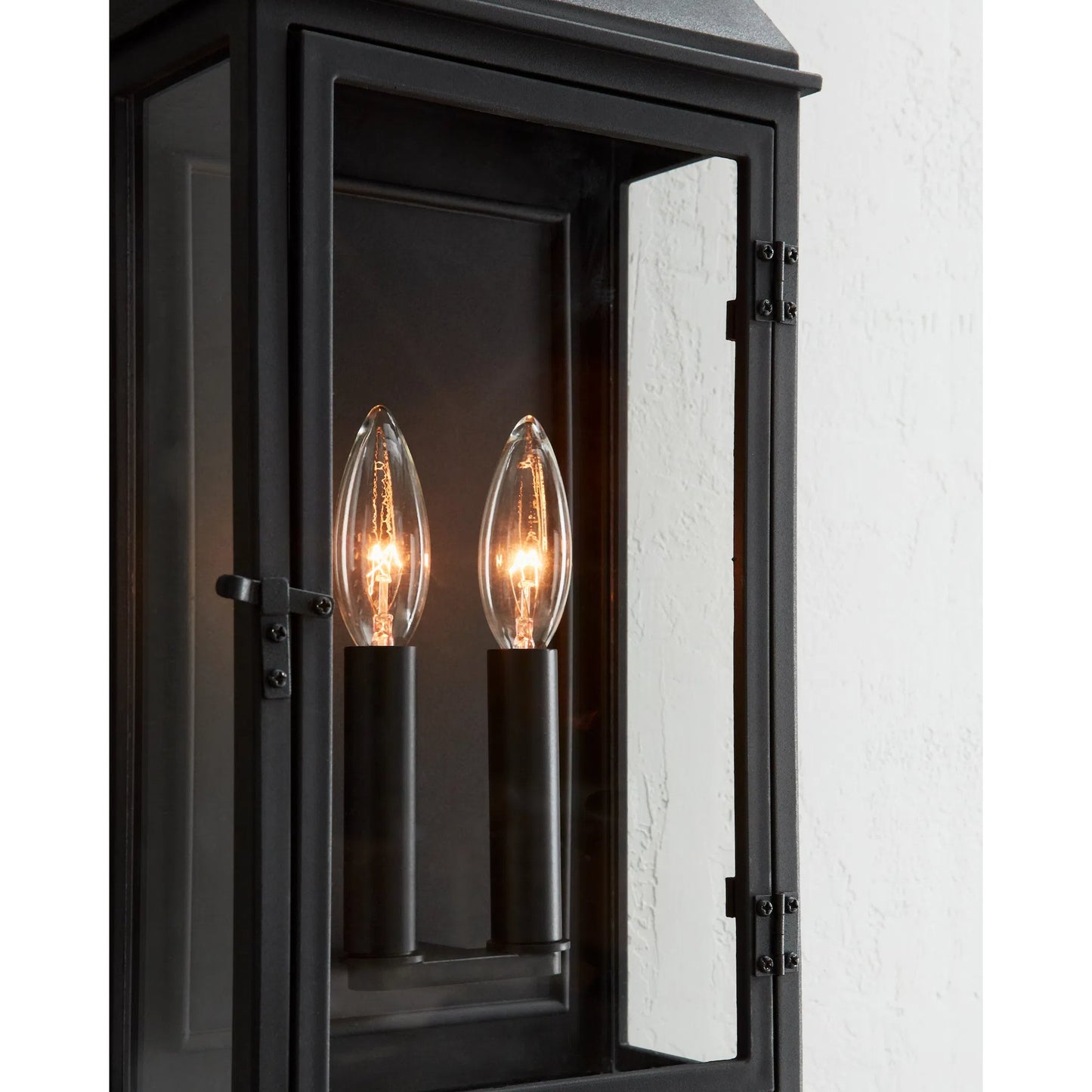 007 SI-2234117 | Closeup | Hingham Medium Outdoor Wall Lantern by Visual Comfort & Co. in textured black. Made from stonestrong in a unique style.