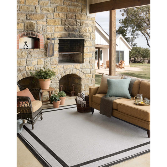 Easton ESN-11 Outdoor Rug by Loloi in onyx, ivory. Made from 100% polypropylene in a unique style.