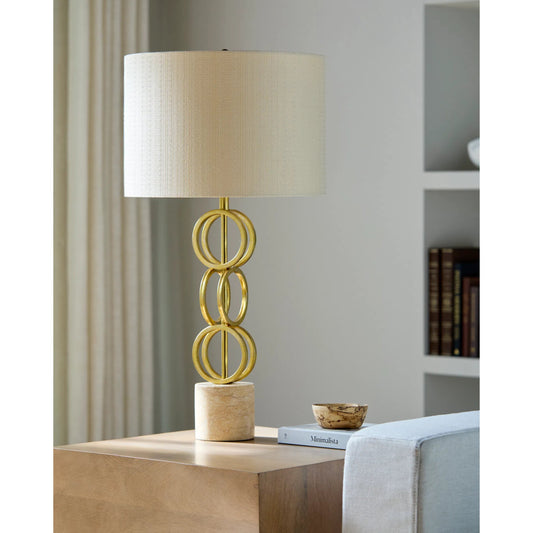 Evans Gold Table Lamp by Surya. Made from iron, marble, linen, polyester in a modern style.
