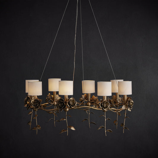 Rosabel Chandelier by Currey and Company in antique brass. Made from brass in a modern style.