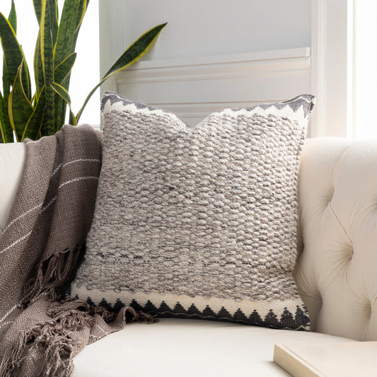 Faroe Pillow - 32356 by Livabliss in cream, ivory, dark brown, charcoal. Made from 70% wool, 30% cotton, 100% cotton in a eclectic & global style.