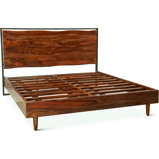Elliston Reclaimed Wood Bed by World Interiors in brown, black and natural sheesham. Made from reclaimed iron sheesham wood in a transitional style.