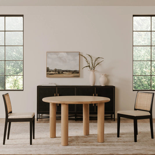 Milo Round Dining Table Oak by Moe's Home Collection in natural solid oak. Made from fsc certified solid oak tabletop edge, fsc certified oak veneer tabletop in a transitional style.
