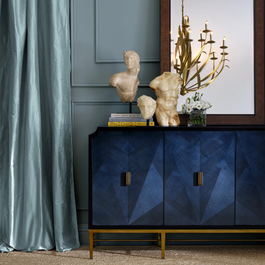 Kallista Blue Credenza by Currey and Company in dark sapphire, caviar black, antique brass. Made from sycamore veneer, mahogany, engineered hardwood, cast brass, iron in a modern style.