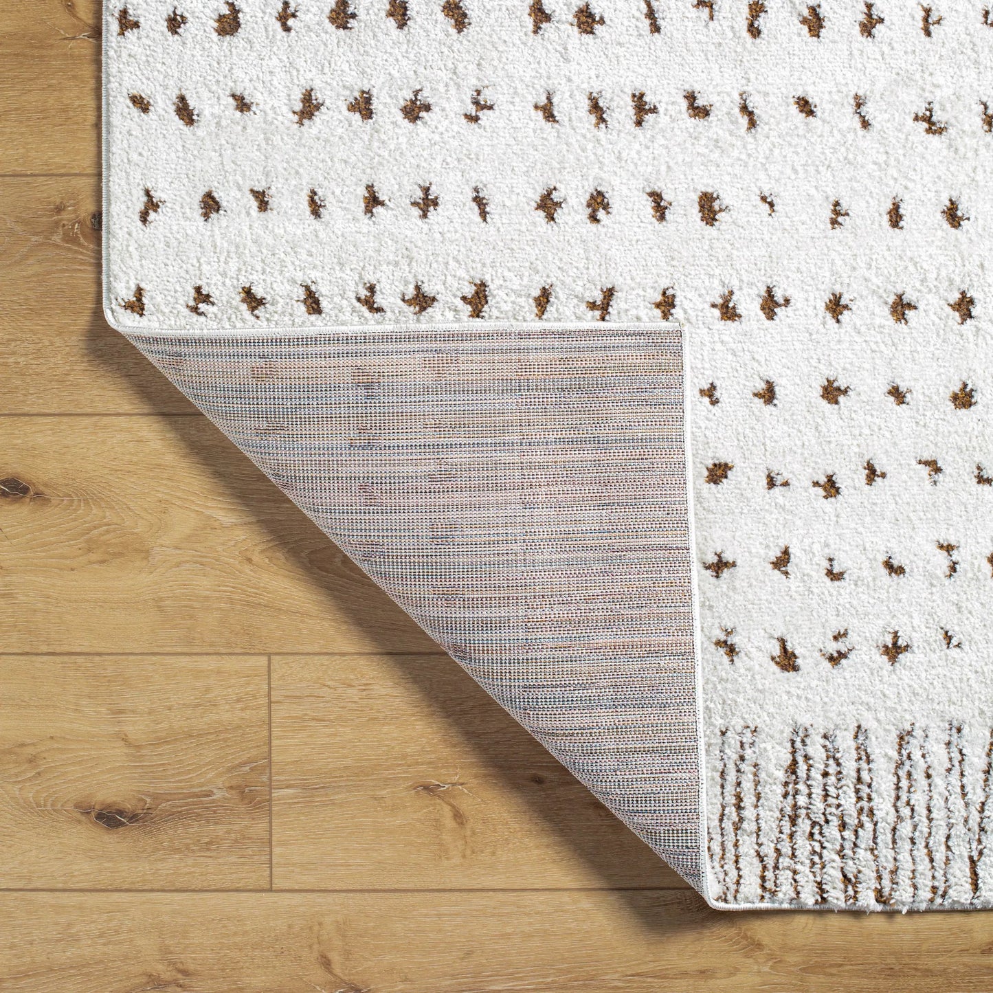 005 SI-2167731,SI-2167732,SI-2167733,SI-2167734,SI-2167735 | Closeup | Freud Rug - 492345 by Livabliss in ivory, brown. Made from polyester in a unique style.